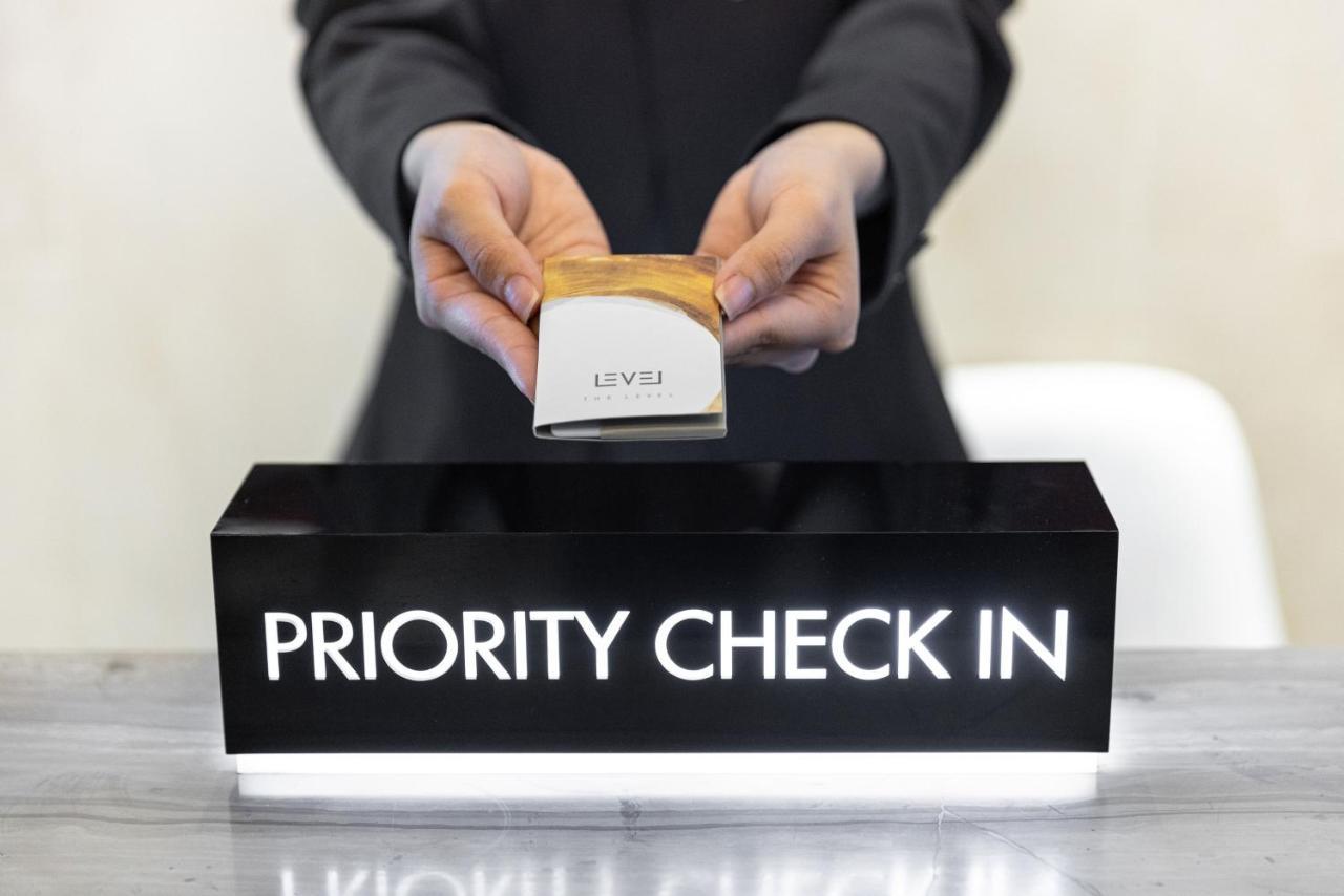 Melia Vinpearl Hue Hotel Exterior photo Priority check-in at an airport